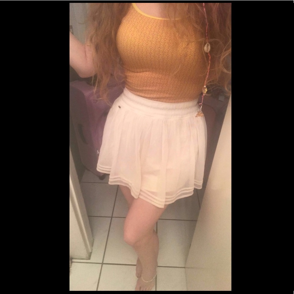 A white/cream colored Hollister mini skirt. 🎀